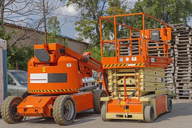 warehouse forklift lifting cargo onto shelves in Bedford